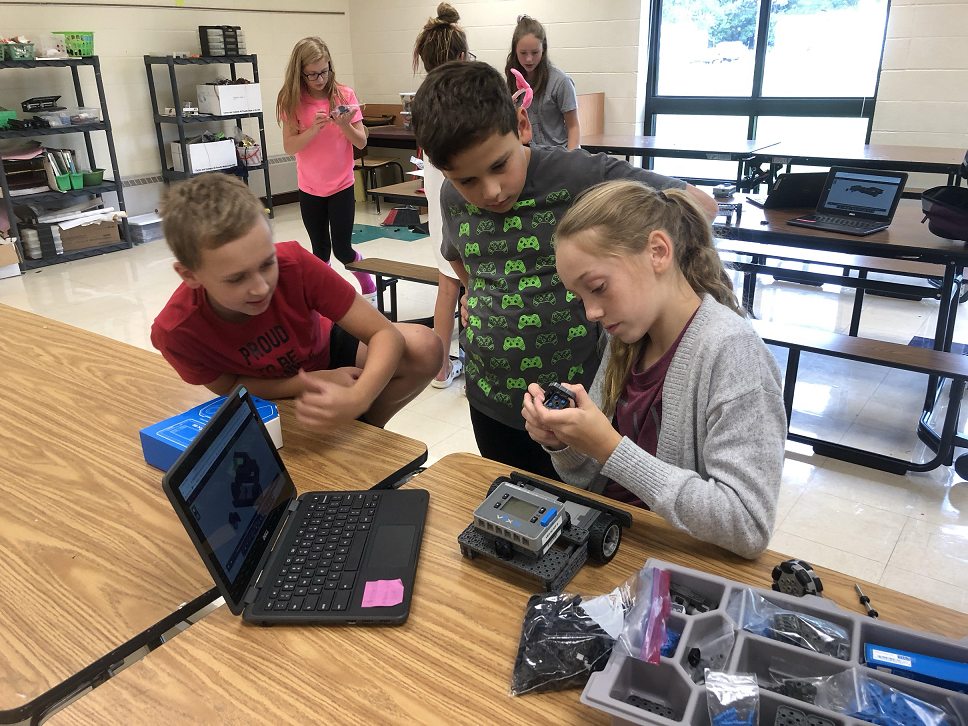 TAG students working with robotics